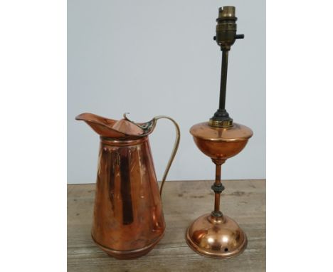 Two pieces of WAS Benson metalware comprising a hot water jug and a table lamp. 