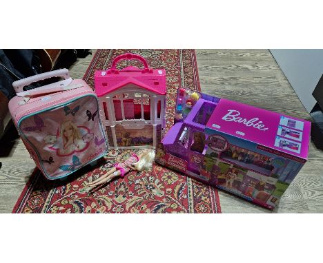 Four Barbie items; Barbie Fresh 'N' Fun Food Truck set, Barbie folding house, clapping Barbie doll and a Barbie doll carry su