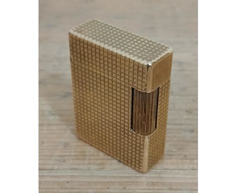 A vintage Dupont gold plated lighter. 