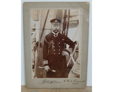Prince George, later King George V, photographic portrait depicting the future King in navy uniform aboard HMS Crescent, sign