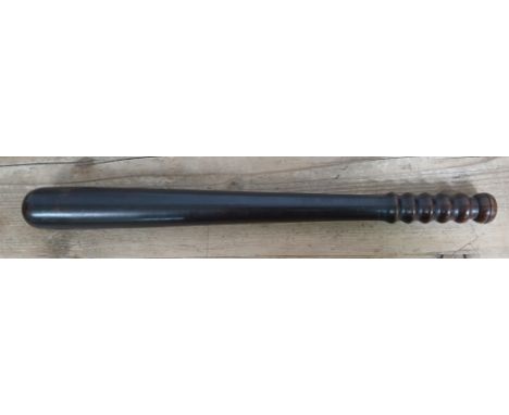 A hardwood truncheon, circa 1900, length 41.5cm.