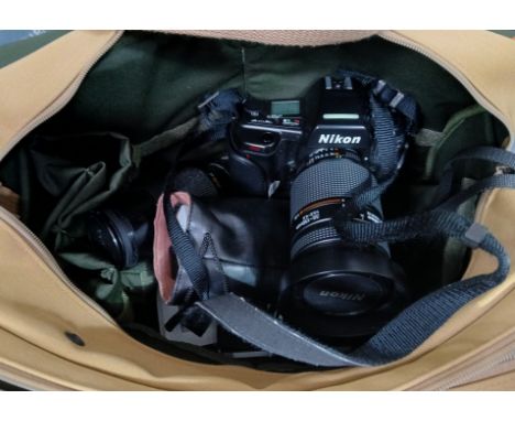 A Billingham camera bag and contents including a Nikon F90 35mm camera, Canon AE-1 Program 35mm, lenses, flash gun, together 