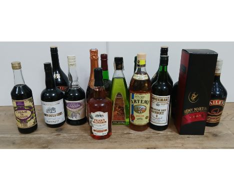 A box of assorted alcohol including Peaky Blinders Irish whisky, Remy Martin VSOP cognac etc.