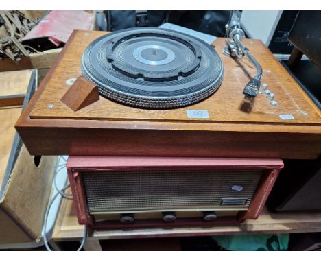 A Dansette record player and another. 