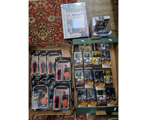 Two boxes of assorted boxed toys to include Star Wars Kenner, Jurassic World Mattel, DC Wonder Women &amp; Frozen puzzles.