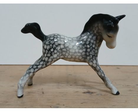 A rare Beswick foal in 'Rocking Horse Grey', length 9cm.