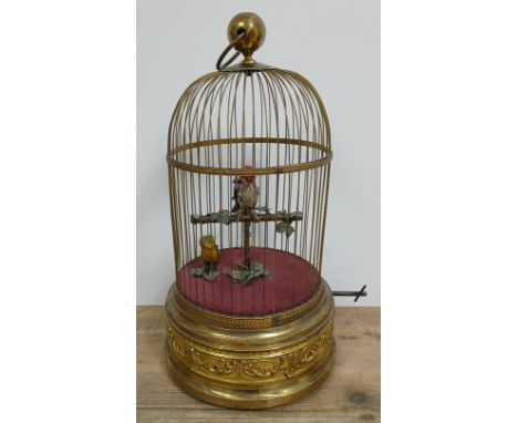 A large French gilt metal singing bird automaton, circa 1900, probably Bonnets, Paris, height 52cm.