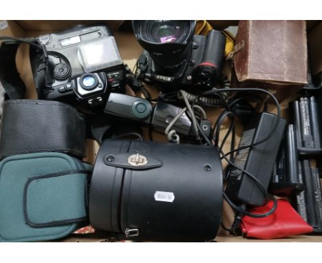 A box of cameras and accessories including Nikon D300s camera, Nikon D1H camera, flash gun, etc.