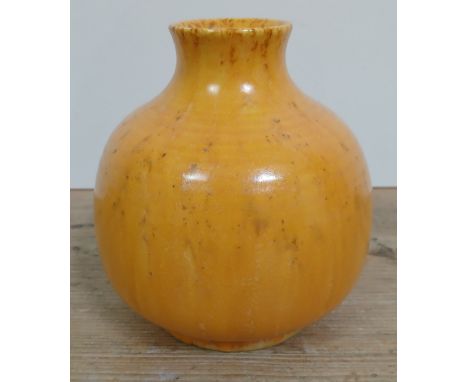 A Pilkingtons Royal Lancastrian mottled yellow vase by Edward Terence Radford, no. 3254, height 13cm.