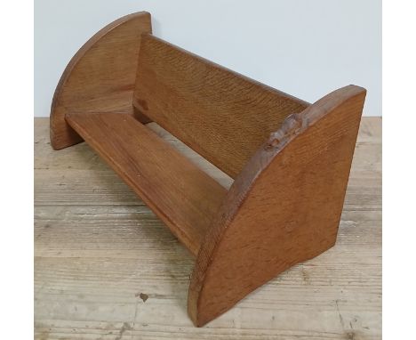 A Roberth "Mouseman" Thompson of Kilburn, English oak book stand, with carved mouse signature and adzed oak ends, length 46cm