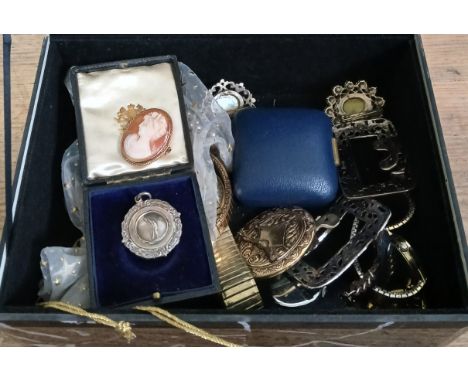 A mixed lot of jewellery and watches including a hallmarked 9ct gold cameo brooch, a hallmarked silver cricket medal, various