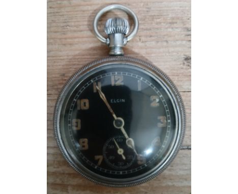 A military Elgin pocket watch, broad arrow to case back and marked 'TK 5058'.