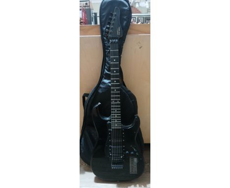 A Casio PG-380 electric guitar with soft case.