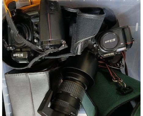 A box of assorted camera equipment including a Nikon F-501 and Nikon F4 cameras, a Sigma 170-200mm lens etc.