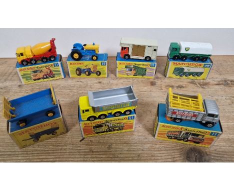 Seven boxed Matchbox diecast models comprising of hay trailer 40, 8 wheel tipper 51, scaffolding truck 11, leyland petrol tan