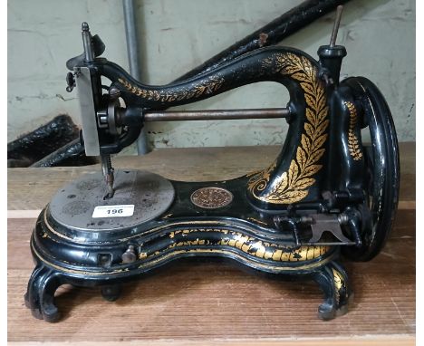 A Victorian Jones hand crank sewing machine. 