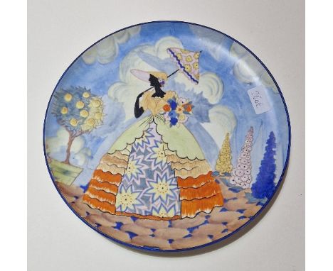 A Carltone Ware pottery charger decorated with a lady holding an umbrella, diameter 32.5cm.