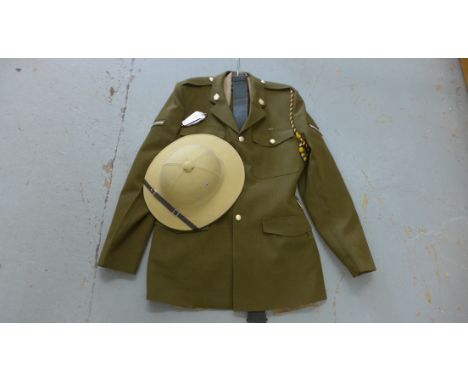 Army uniform, believed to be 254 Medical Regiment Field Ambulance Cambridge. Consists of tunic, trousers, belt, shirt and tie