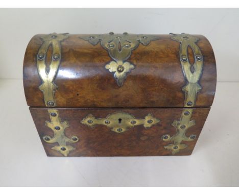 A good Victorian brass bound walnut 2 section dome top tea caddy 17cm tall, 23cm x 13cm some wear but generally good conditio
