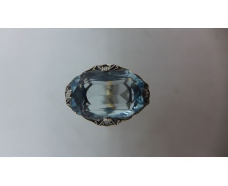 An art deco 14ct yellow and white metal Aquamarine and diamond ring, the emerald cut aquamarine approx 17.5mm x 11mm x 7.5mm 