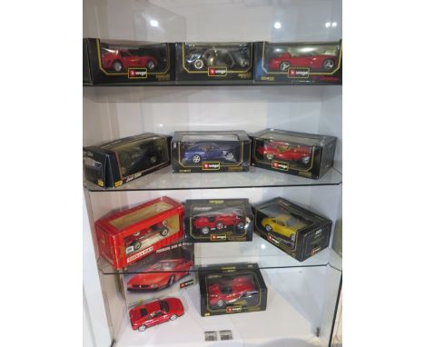 A collection of 9 Burago 1/18 scale boxed sports cars and a boxed Tonk Polistil Ferrari 500 F2, all good condition, minor wea