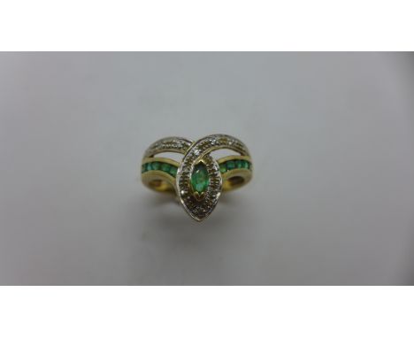 A hallmarked 9ct Emerald ring, size O, approx 3.2gs some general usage marks otherwise generally good condition. 