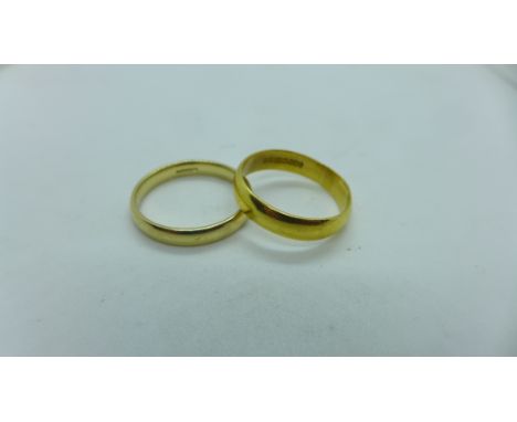 A 22ct gold hallmarked band ring, size O, approx 3.8 grams and a 9ct gold hallmarked band ring, size P, approx 2.3 grams. Gen