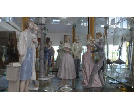 4 x Lladro figure/groups and a Nao figure of a doctor, all good except the thumbs are missing from lamplighter.