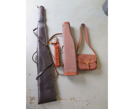 A leg O mutton canvas and leather gun case, a leather gun sleeve, a leather cartridge belt and a Parson's and Sons leather an