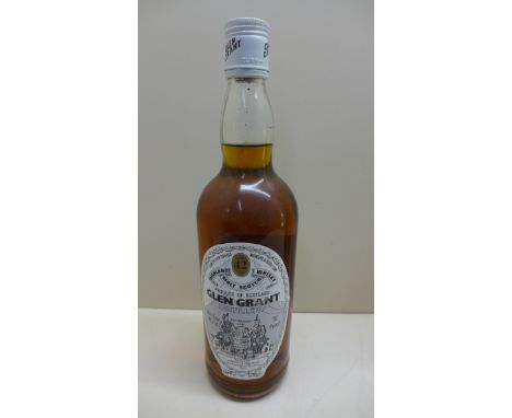 A bottle of Glen Grant 42 year old highland malt scotch whisky 70% proof bottled by Gordon &amp; Macphail Elgin level good 