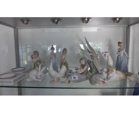 A collection of 4 Lladro figures, 2 Lladro boxed dishes with stands and 8 Nao figures - all generally good condition 