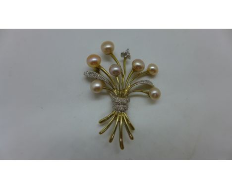 A hallmarked 9ct gold pearl and diamond brooch 4 x 3cm approx 4.4gs in generally good condition 