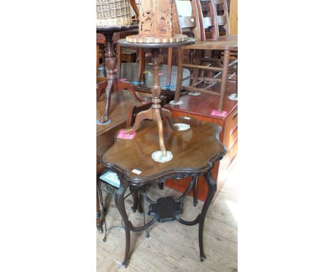 An Edwardian Mahogany shaped top occasional table, a pie crust tripod snap top table, a wine table, a small Indian table, a w