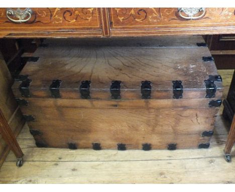 A vintage metal bound trunk by "Rossi, Norwich"