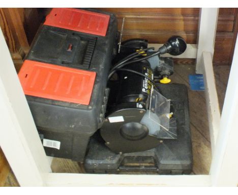 A 150mm bench grinder and a boxed Stanley socket set