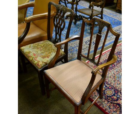 A mahogany Chippendale style chair with Gothic shaped splats, outswept arms and drop-in seat, on square chamfered and reeded 