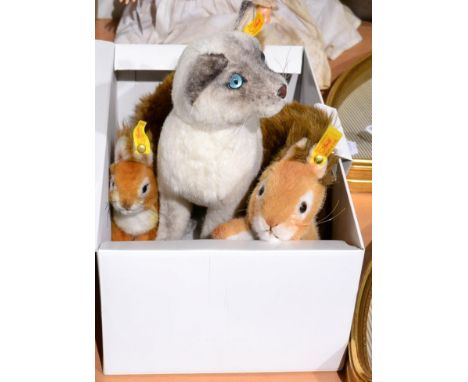 Steiff Siamese seated cat in original box, together with two Steiff squirrels (3)