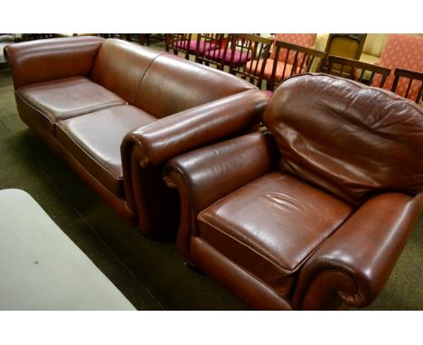 Modern brown leather three-seater sofa and matching armchair 