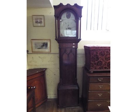 A longcase clock, the 33 cm arched square painted dial with subsidiary seconds and calendar dials, fitted an eight day moveme