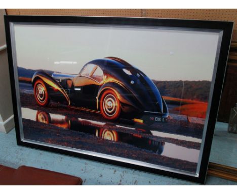 PRINT, of a saloon racing car in a glazed frame, 112cm x 62cm.