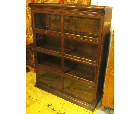 GLOBE WERNICKE STYLE BOOKCASE, early 20th century oak, four tier with glazed panelled doors, 128.5cm W x 157cm H x 36cm D. (w