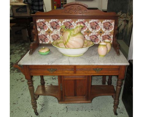 WASHSTAND, Edwardian satin walnut with tiled splash back, marble top, two drawers and a door, 123cm H x 115cm x 48cm D (with 