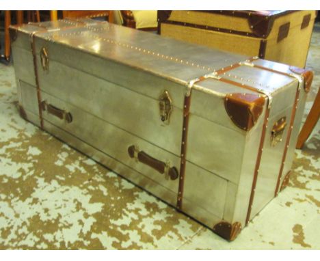 TRUNK, Aviator style metal clad with leather strapwork having a rising top with a long drawer below, 120.5cm W x 45cm H x 41.