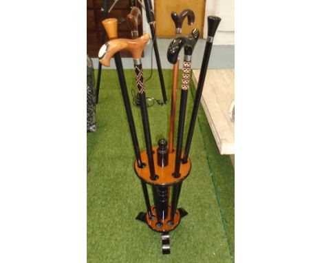 STICK STAND, wooden with six walking canes, 97cm H. (6)