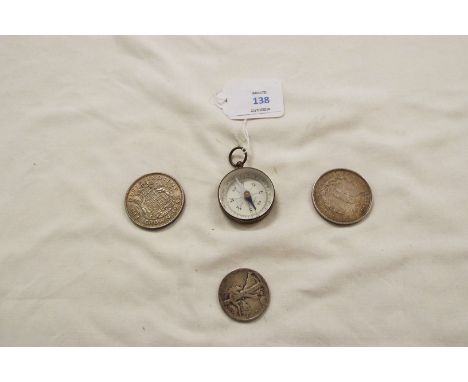 A silver American one dollar piece 1921 together with a silver American half dollar, a 1937 crown piece and a compass