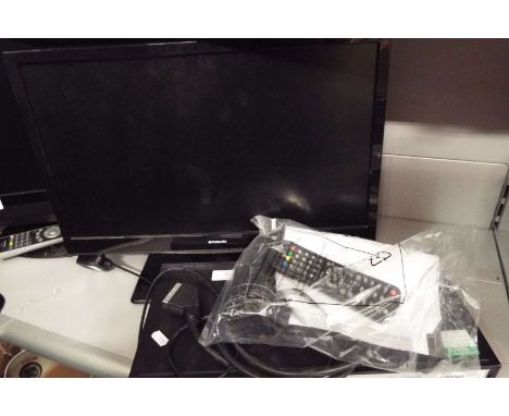 A Polaroid colour television and DVD player 