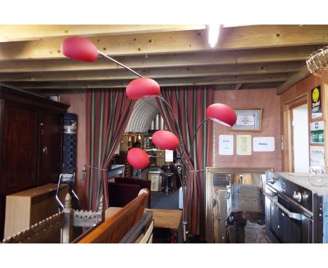 A contemporary chrome lamp having marble base and ruby glass shades 
