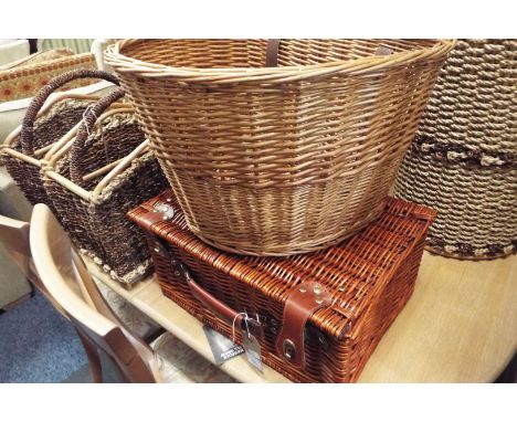A wicker hamper and a wicker cycle basket as new