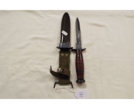 A U.S. Marine dagger in scabbard marked U.S. M8A1