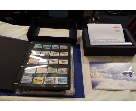 A mixed selection of assorted stamps of the World, first day covers, stock sheets and a boxed Millennium Collection first day